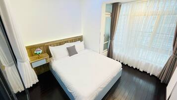 Deluxe Condo, City View | Desk, laptop workspace, free WiFi