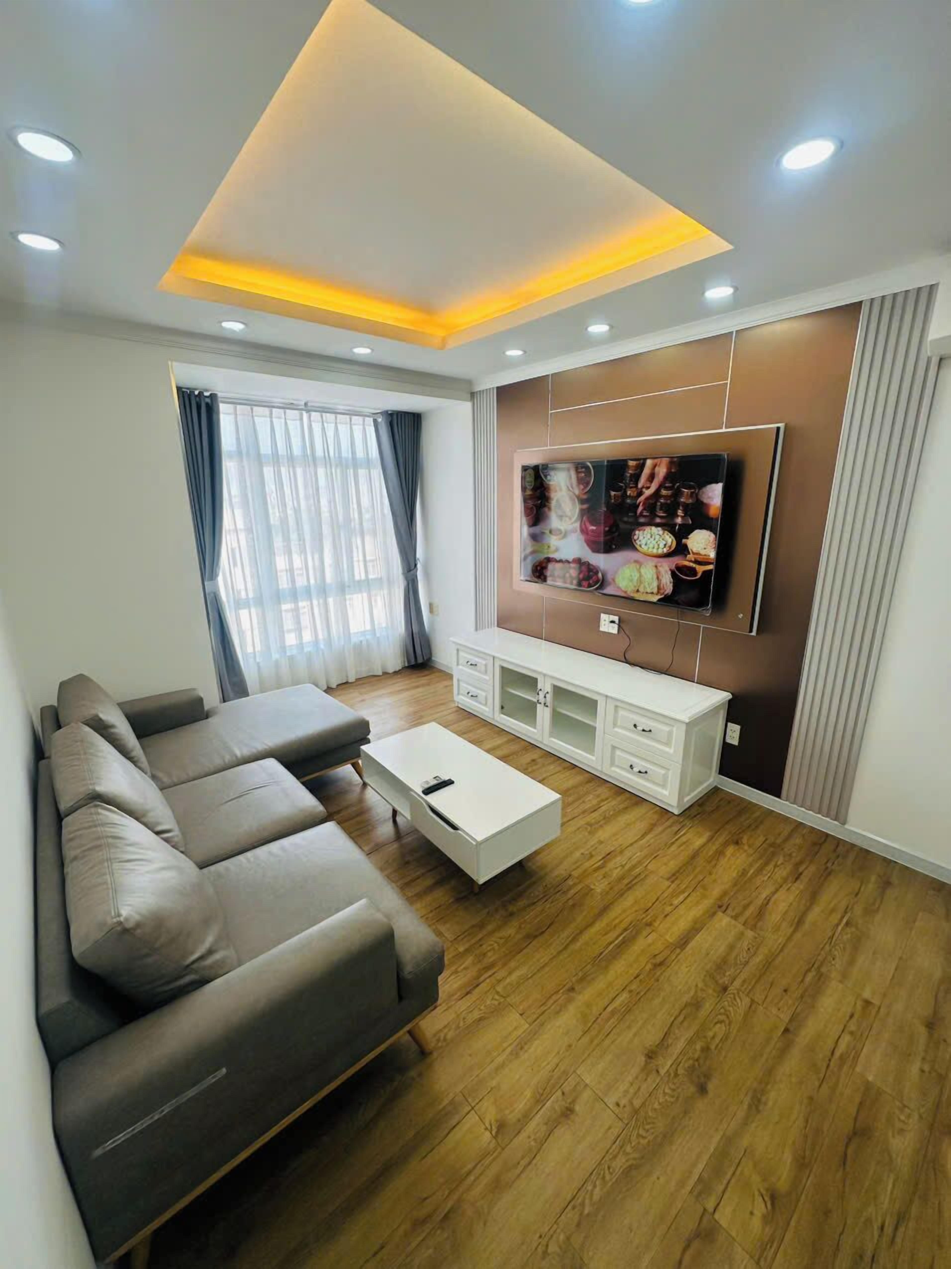 Apartamento Premier | Zona de estar | Una chimenea, suelo radiante