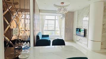 Deluxe Apartment, 3 Bedrooms, River View | Living area