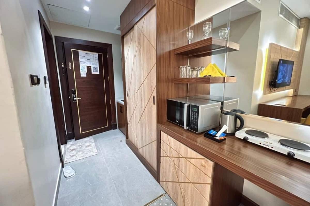 Luxury Studio Suite, City View | Private kitchenette | Fridge