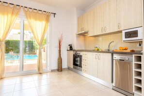 Villa | Private kitchen | Highchair