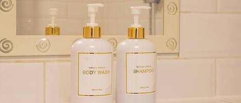 Hair dryer, towels, soap, shampoo