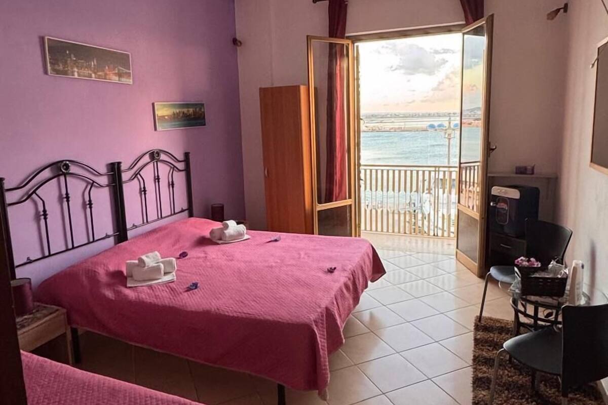 Family Room, Balcony, Sea View | Laptop workspace, iron/ironing board, free WiFi