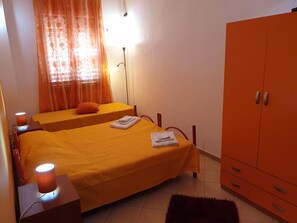 Standard Triple Room, Sea View | Laptop workspace, iron/ironing board, free WiFi