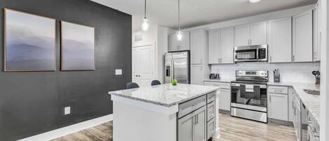 Fridge, stovetop, dishwasher, cookware/dishes/utensils