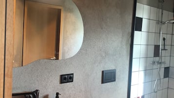 Shower, hair dryer, towels, toilet paper