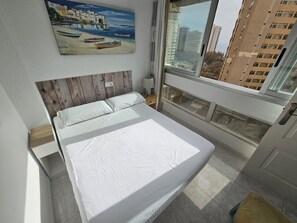 Apartamento | 2 dormitorios y tabla de planchar con plancha