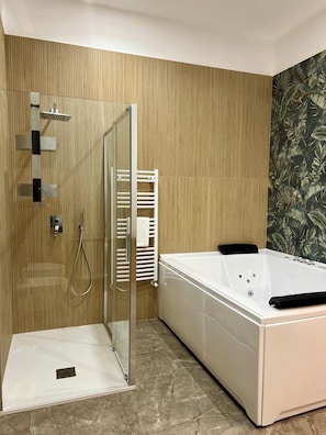 Luxury Apartment | Bathroom | Hair dryer, slippers, towels, soap