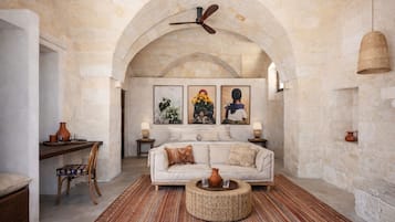 Luxury Double Room, Patio, Courtyard View | Minibar, in-room safe, iron/ironing board, free WiFi