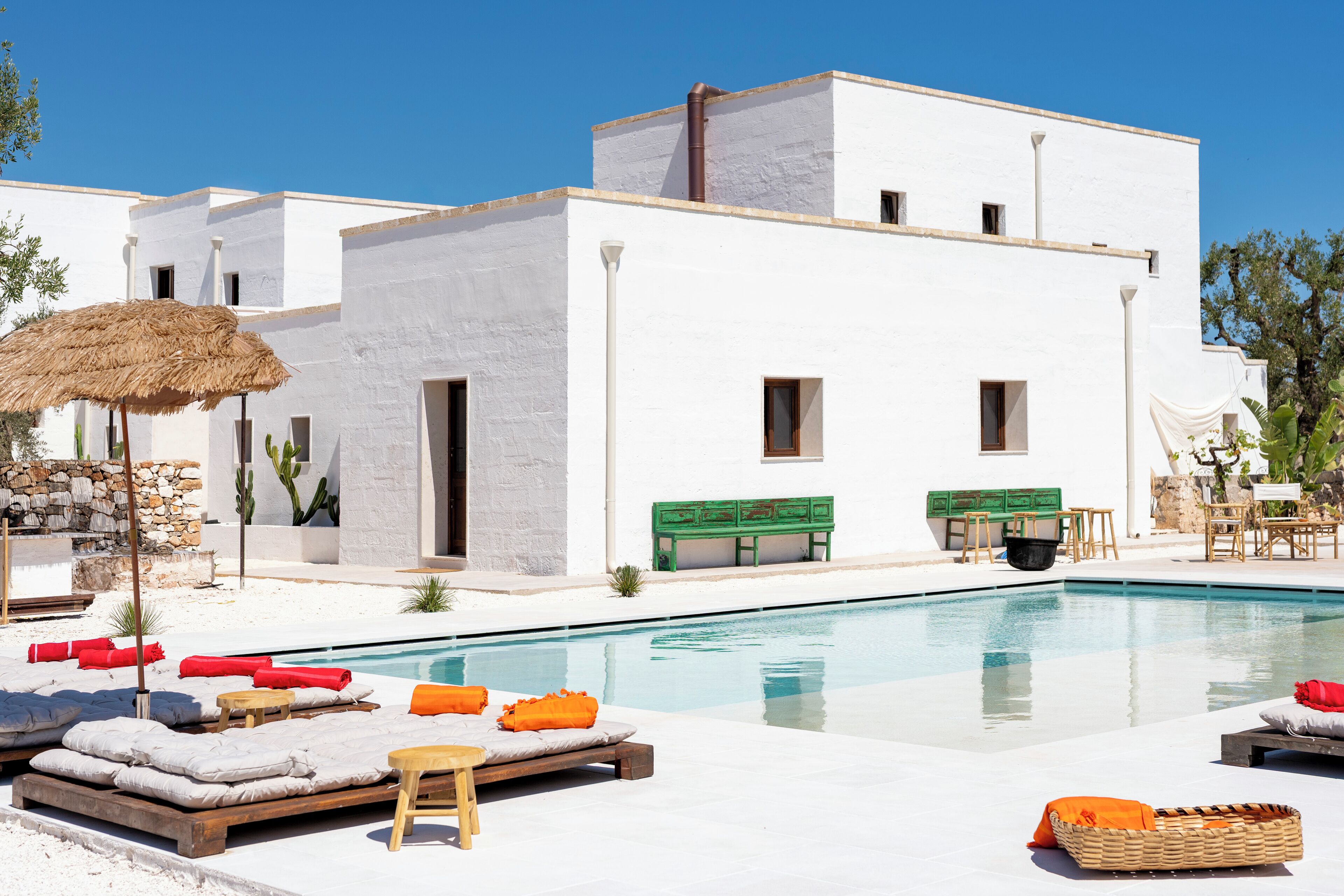 Seasonal outdoor pool, open 10:00 AM to 7:00 PM, pool umbrellas
