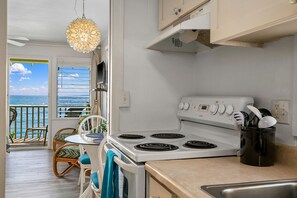 Fridge, microwave, oven, stovetop - Oceanfront Studio with Panoramic Views - Kapa'a Sands 07 (Kapaa)