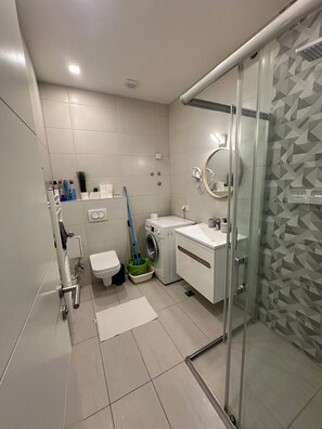 Hair dryer, bidet, towels, soap