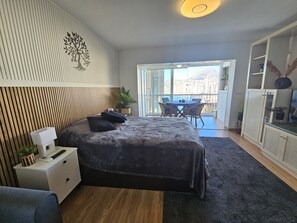 1 quarto, ferros/tábuas de passar roupa
