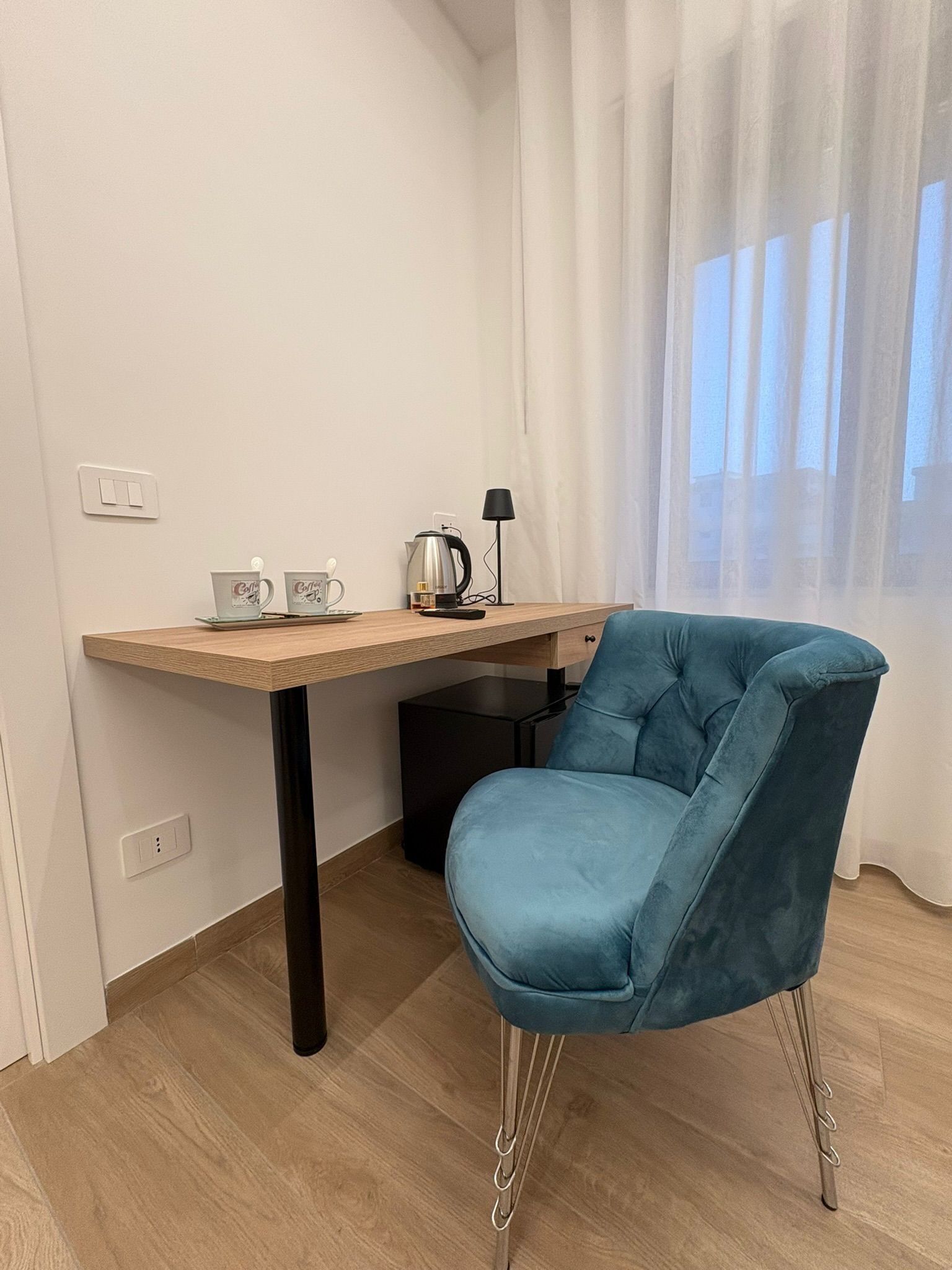 Doppia Deluxe, vista cortile | Una cassaforte in camera, tende oscuranti, Wi-Fi gratuito