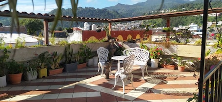 Outdoor dining. HOTEL LOS OLIVOS