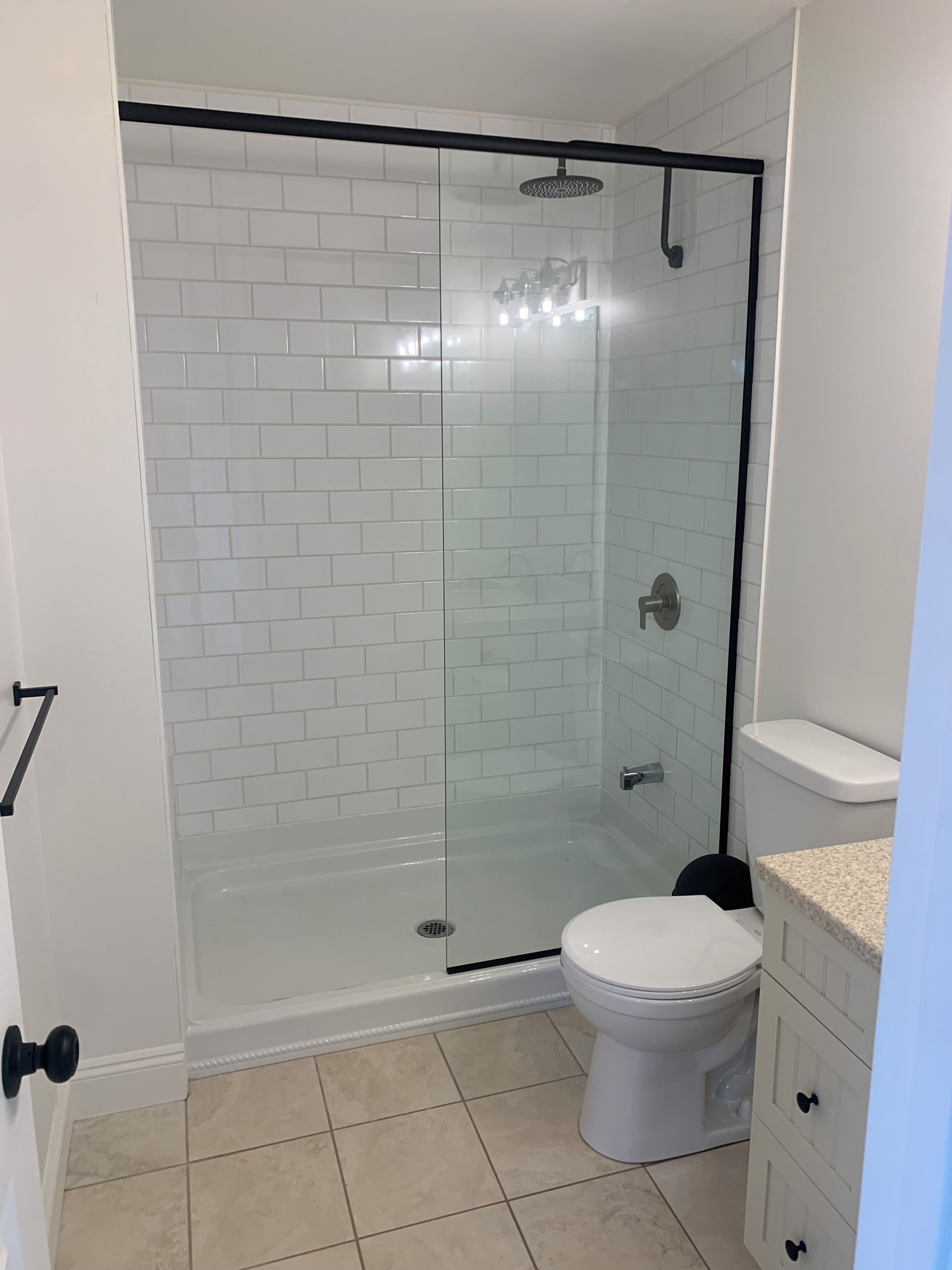 Shower, towels, soap, toilet paper