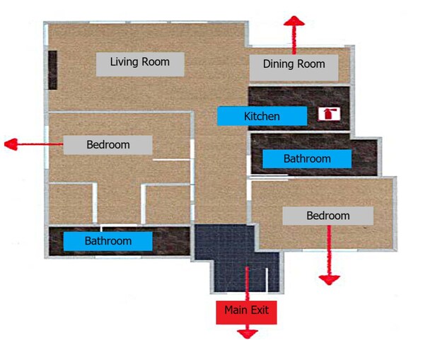 A floor plan with a living room, dining room, kitchen, two bathrooms, two bedrooms, and a main exit. - Mountain Retreat, Golf, Spa & Scenic Escape 635 (Mammoth Lakes)