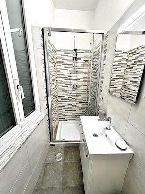 Hair dryer, towels, soap, toilet paper