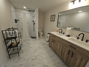 Shower, hair dryer, towels, soap