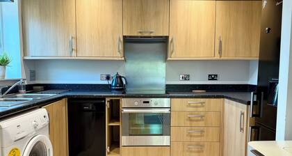 Bright & Spacious 1-Bed Apartment with Balcony & Private Parking