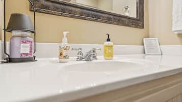 Hair dryer, towels, soap, toilet paper