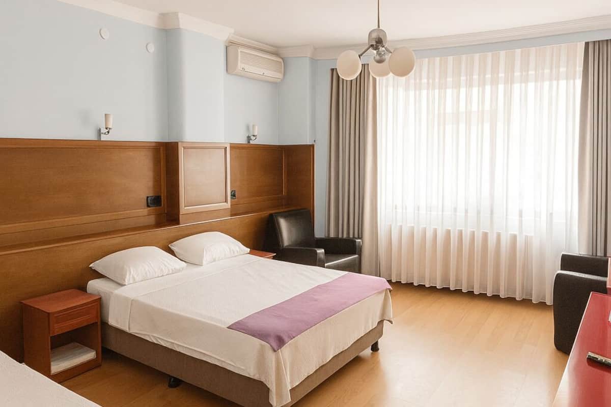 Desk, laptop workspace, blackout curtains, free WiFi