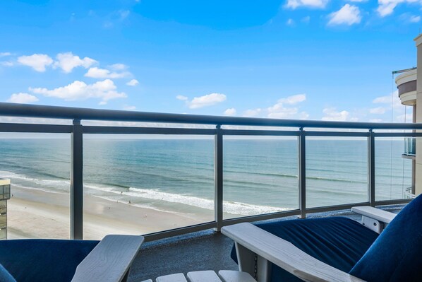 On the beach, sun loungers, beach towels