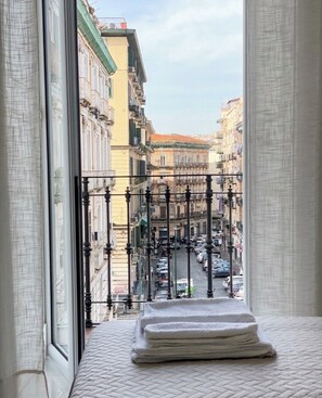 Double Room, City View | Desk, iron/ironing board, free WiFi, bed sheets