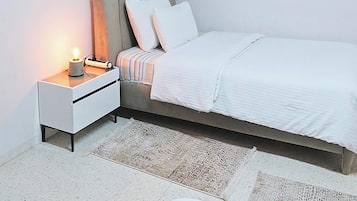 2 habitaciones, tabla de planchar con plancha, wifi y ropa de cama