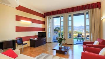 Suite, Lake View | Living area | TV