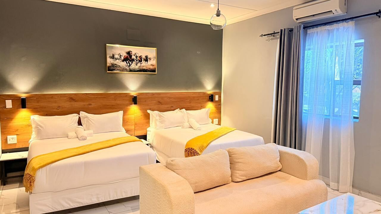 Family Double or Twin Room, 2 Queen Beds | Desk, laptop workspace, iron/ironing board, free WiFi