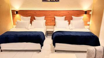 Family Twin Room | Desk, laptop workspace, iron/ironing board, free WiFi