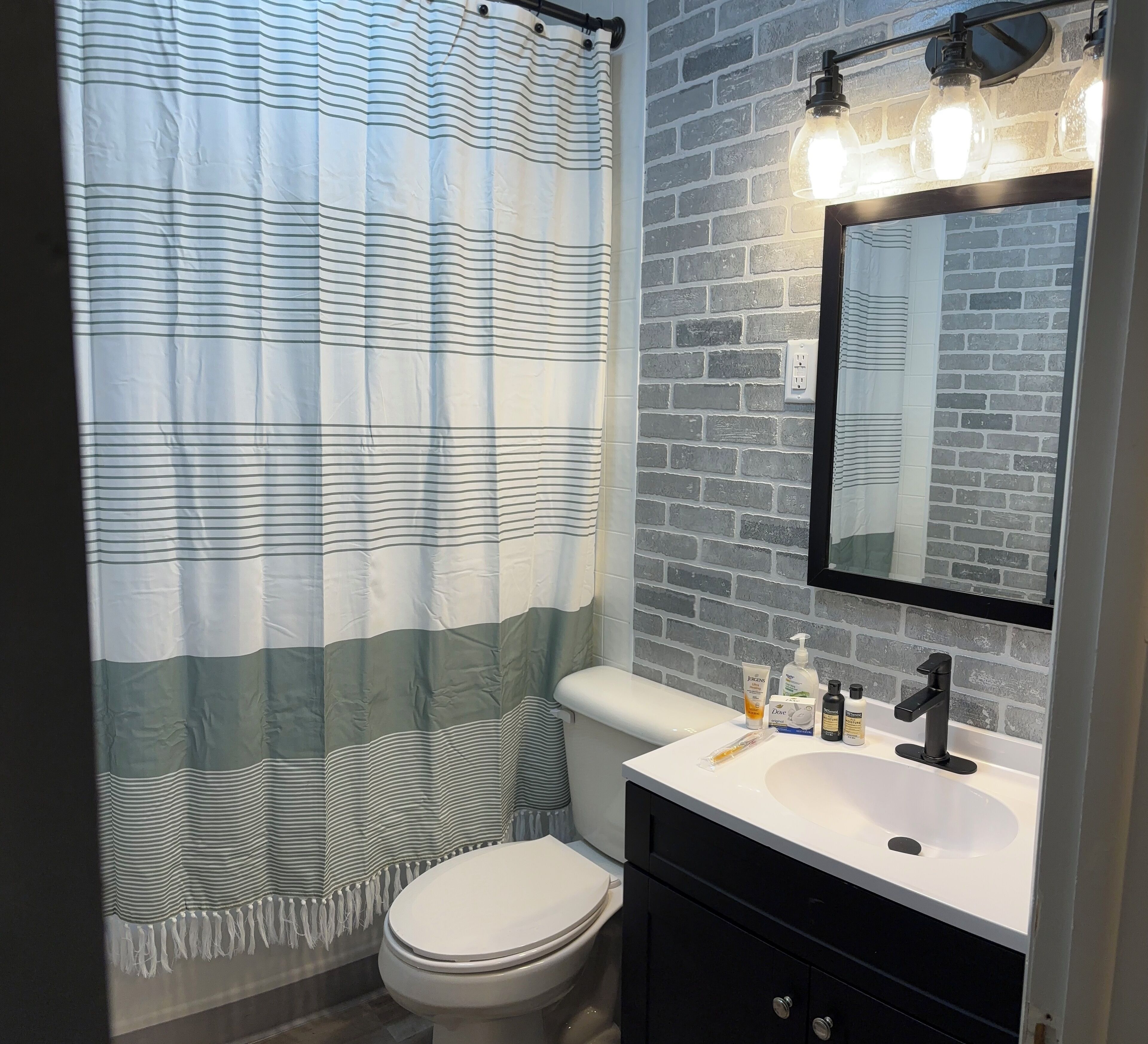 Hair dryer, towels, soap, toilet paper