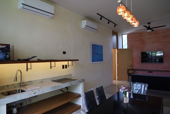 Deluxe Apartment, Garden View | Private kitchen | Fridge, microwave, stovetop, cookware/dishes/utensils