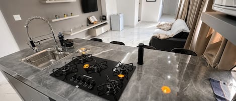 Fridge, electric kettle, toaster, toaster oven