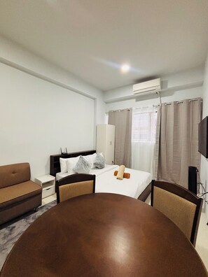 Room, 1 Bedroom, Balcony, Pool View | Living room - Room-inviting Space for Rest & Relaxatio (Iloilo)
