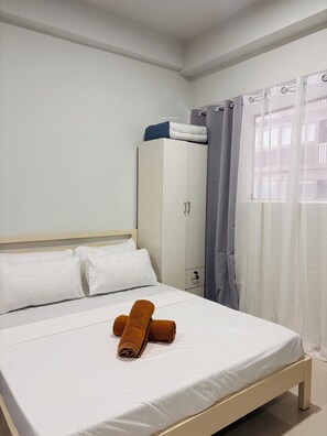 Room, 1 Bedroom, Balcony | 1 bedroom - Room-minimalist Comfort With Homey Touch (Iloilo)