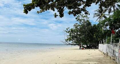 "Walking distance from the Beach Perfect for Couples/Families”Complete Amenities