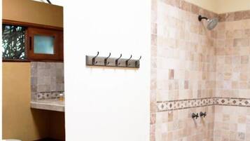 Shower, towels, soap, toilet paper