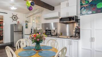 Fridge, microwave, stovetop, coffee/tea maker
