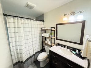 Hair dryer, towels, soap, shampoo
