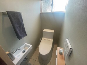Hair dryer, towels, soap, toilet paper