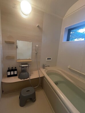 Hair dryer, towels, soap, toilet paper