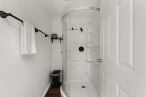Shower, towels, soap, toilet paper