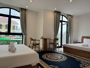 Comfort Quadruple Room, Balcony, Garden View | Desk, free WiFi, bed sheets - Gio Bien Homestay - Sea Breeze (Phu Quoc)