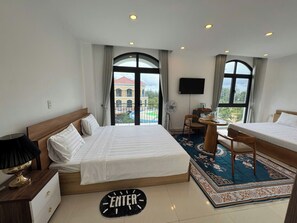 Standard Quadruple Room, Balcony, Garden View | Desk, free WiFi, bed sheets