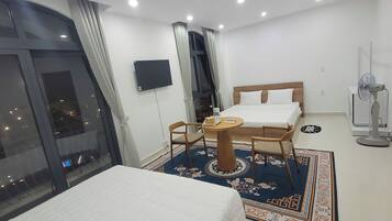 Standard Quadruple Room, Balcony, Garden View | Desk, free WiFi, bed sheets