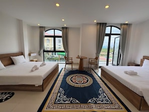 Comfort Quadruple Room, Balcony, Garden View | Desk, free WiFi, bed sheets - Gio Bien Homestay - Sea Breeze (Phu Quoc)