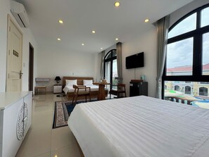 Standard Quadruple Room, Balcony, Garden View | Desk, free WiFi, bed sheets - Gio Bien Homestay - Sea Breeze (Phu Quoc)