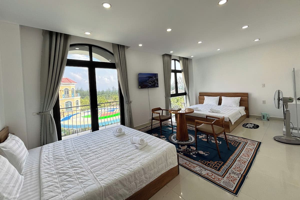 Standard Quadruple Room, Balcony, Garden View | Desk, free WiFi, bed sheets